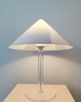 1980s plexiglass table lamp in the style of Harco Loor with white cone-shaped shade and transparent stem, switched on